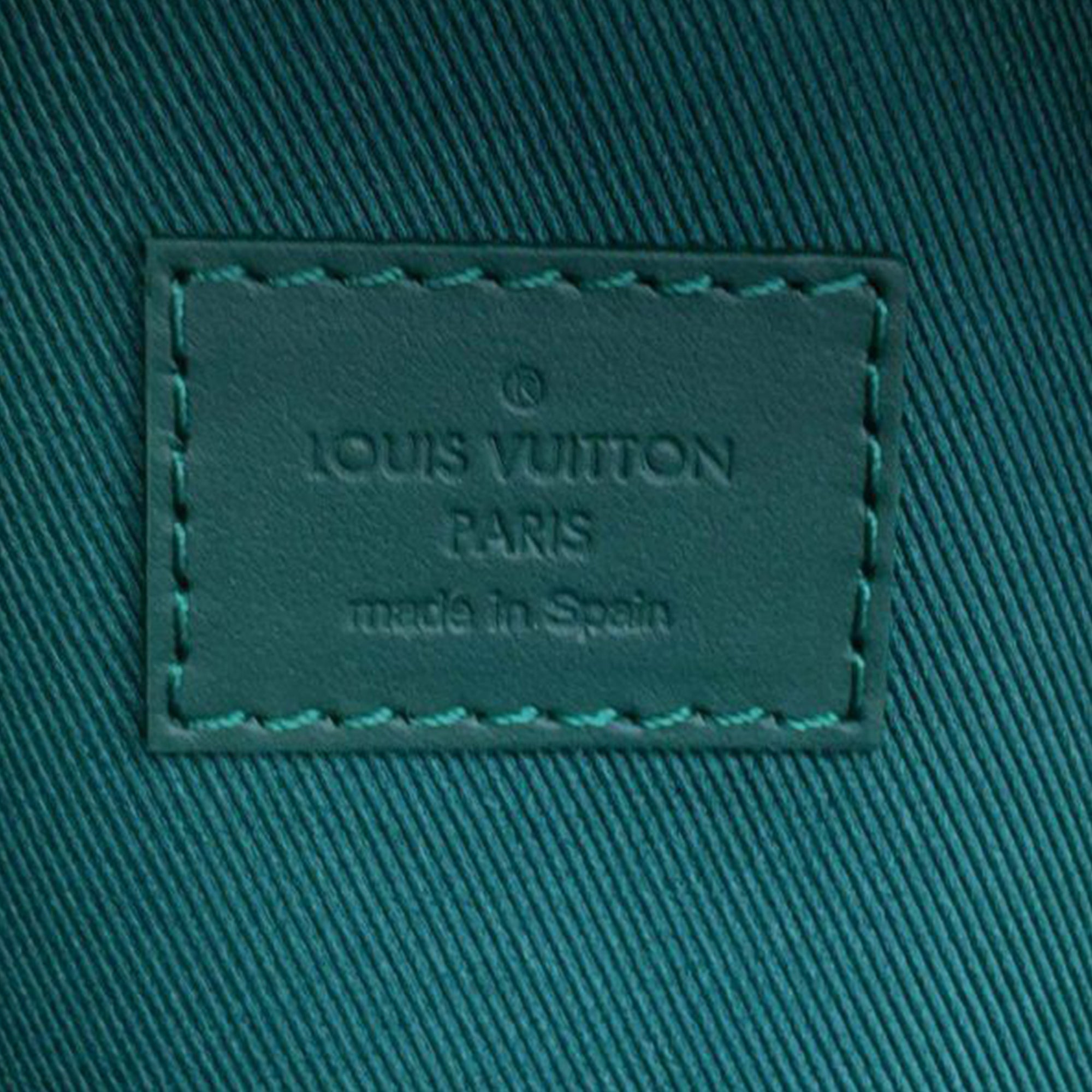 Monogram Heritage Discovery Backpack PM